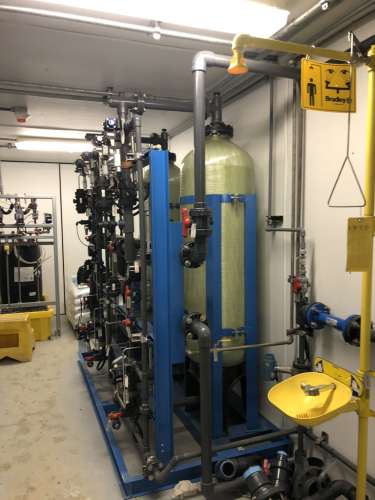 Shipping Container with Potable Water Treatment System